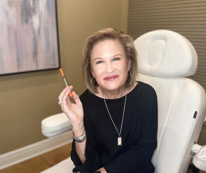 Doctor holding injectable