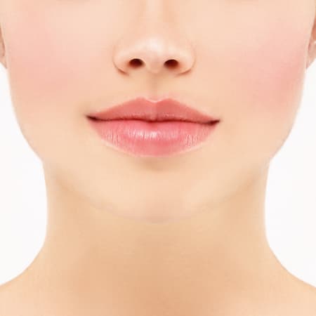 closeup portrait of young woman with beautiful lips