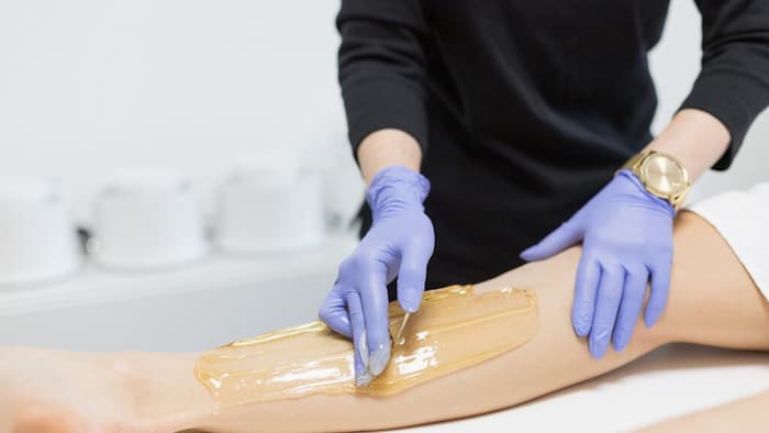 Cosmetic procedure. Depilation with wax. Beauty and health. Bright skin.