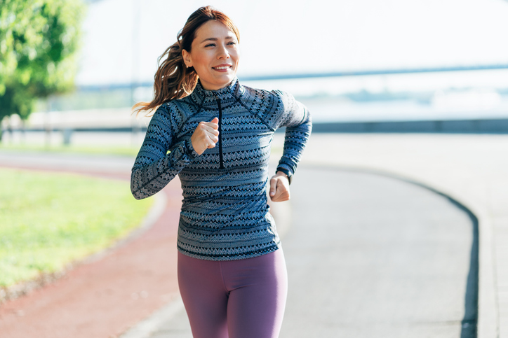 Happy Sportswoman Running